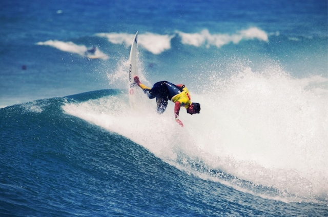 Someone doing a back hand surfing